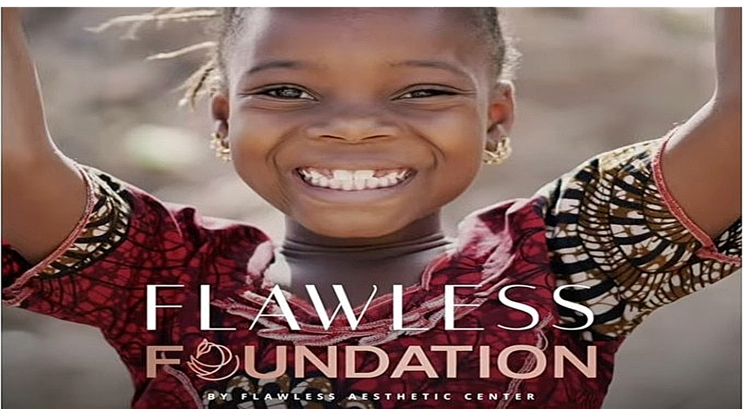 Smiling girl with joyful expression and vibrant attire.